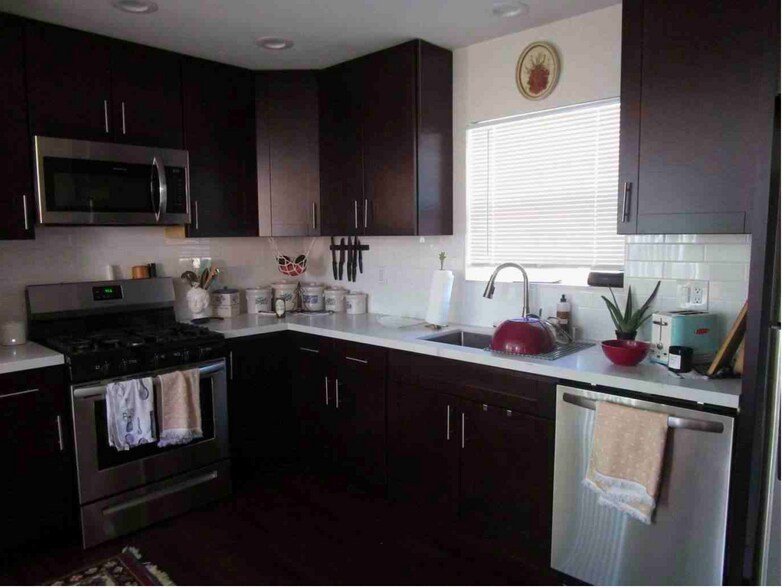 Updated kitchen with all new appliances - 4334 Swift Ave