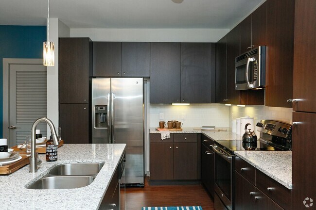 Building Photo - Your New Apartment Comes with 1 Month FREE!