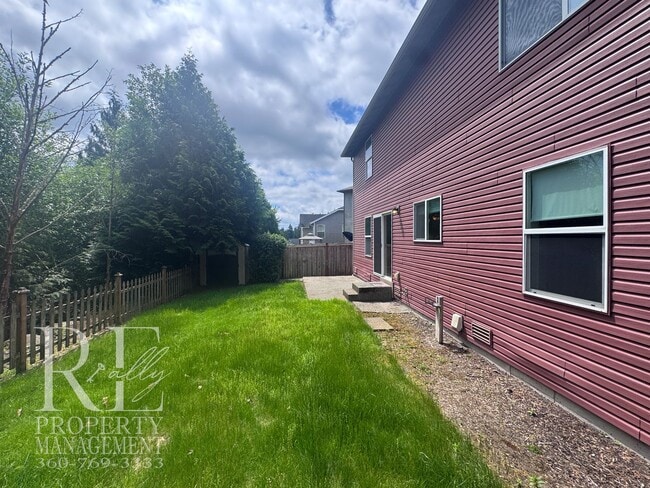 Building Photo - Spacious 4-Bedroom Home with Brand-New Carpet, Two Living Areas & Loft