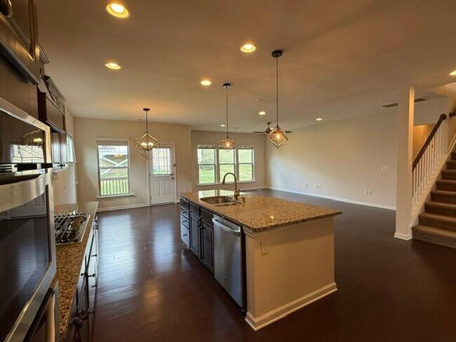 Building Photo - 1009 Magnolia Blossom Ln