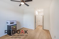 Building Photo - Welcoming Studio with Hardwood Style Floor...