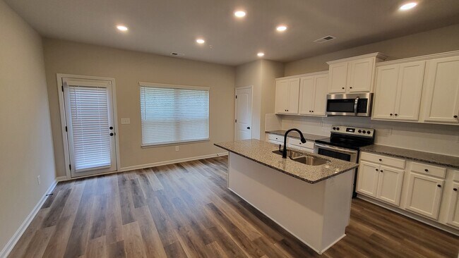 Kitchen - Alternate View with door to elevated Deck - 1373 Bayrose Cir