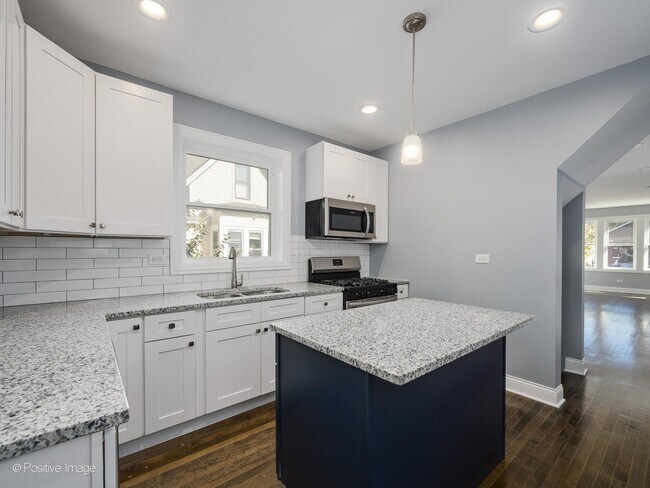 Building Photo - 5156 S Spaulding Ave