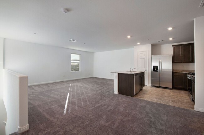 Building Photo - Newer Townhome - 3 Bedrooms + 2 Car Garage - E Craig & Nellis