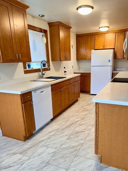 Side door to backyard and carport - 10734 35th Ave NE