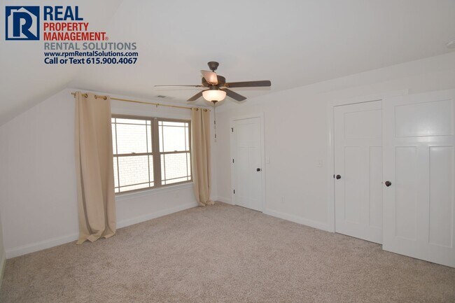 Building Photo - All brick 4 bedroom home plus Bonus room! Garage and covered patio!