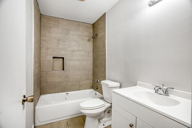 Building Photo - Fully Remodeled 2 Bed / 2 Bath Lower-Level Condo with Balcony