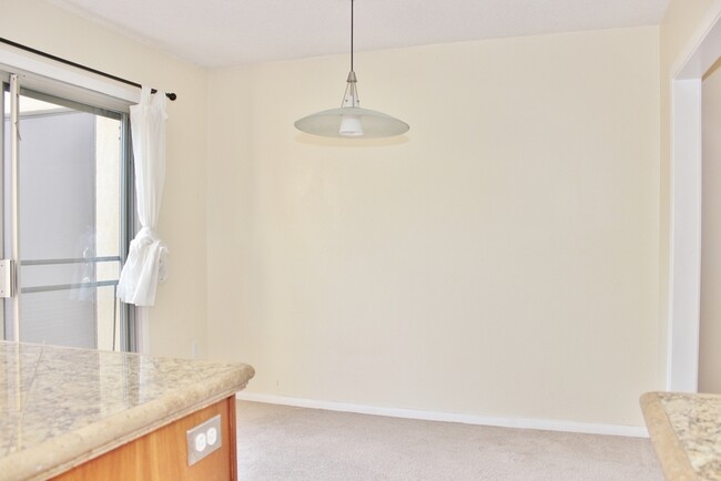 Building Photo - Updated 2B/1.5BA Condo w/ 2 Parking Spaces...