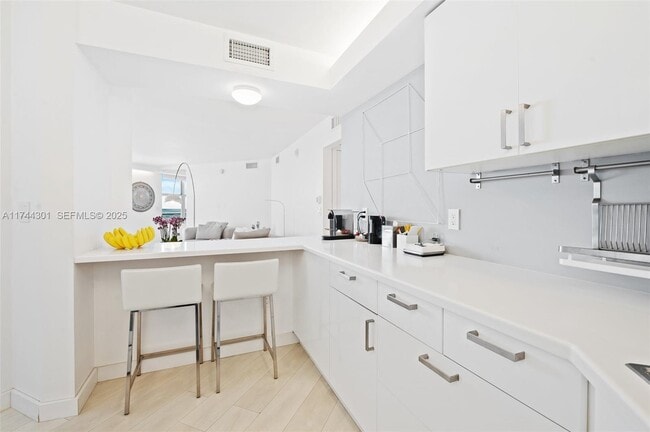 Building Photo - 9511 Collins Ave