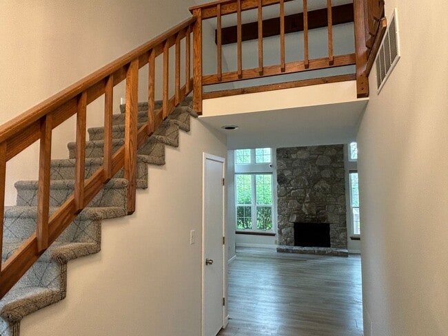 Building Photo - Charming Condo in a Can't-Miss Location – Private Deck, Garage, and Nature-Filled Community