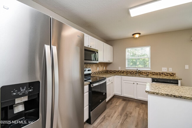 Building Photo - 9273 Caracara Drive