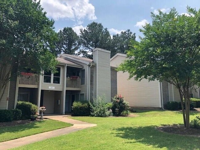 Building Photo - 6687 Whispering Oaks Place #2