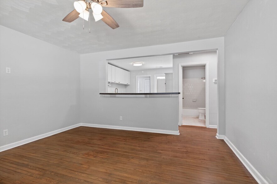 living room open to kitchen - 404 Roselynn Ln