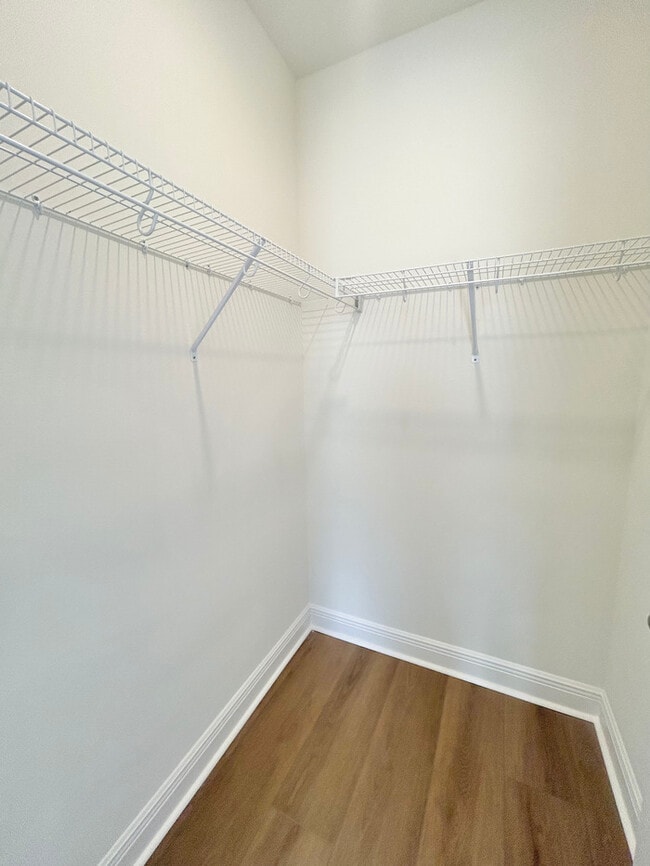 Building Photo - Modern 1/1 Garage Apartment Living in the Heart of Laureate Park!