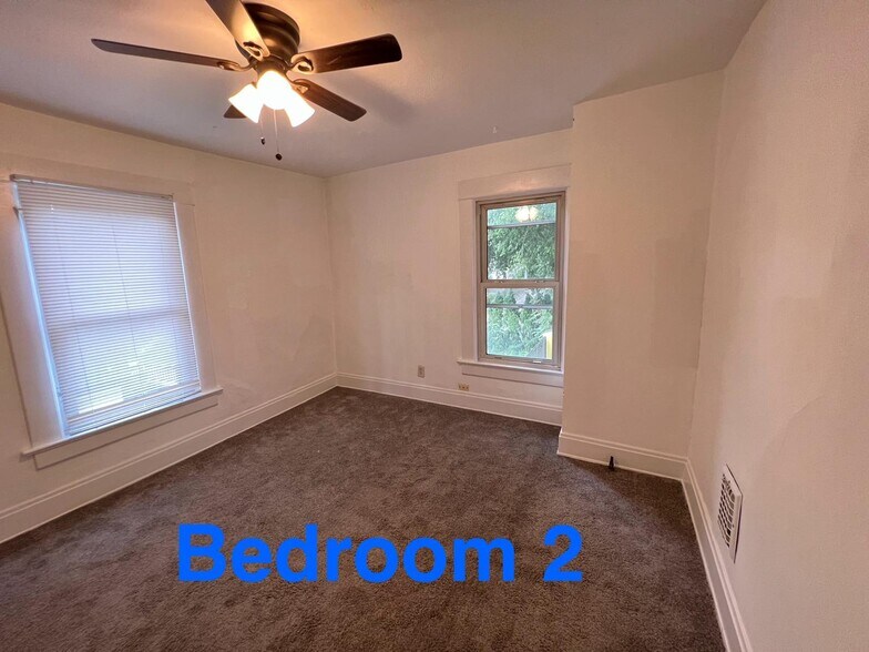 BR #2 from the door facing Side and Rear - 244 E Oakland Ave