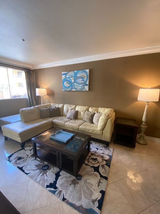 Building Photo - Fully furnished 2 bedroom unit in 24/7 guard gated community