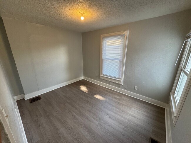 Building Photo - Interested in a two-bedroom house that includes a large garage. Please let us know