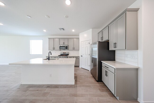 Building Photo - Modern Mountainside Living: Stunning New 4-Bedroom Home in Estrella Crossing! 3 CAR GARAGE!