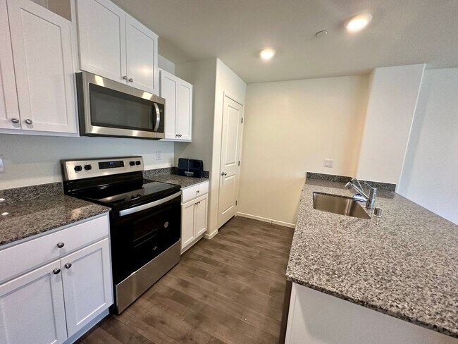 Building Photo - Cadence Modern 2-Story Townhome with Smart Features & Community Amenities