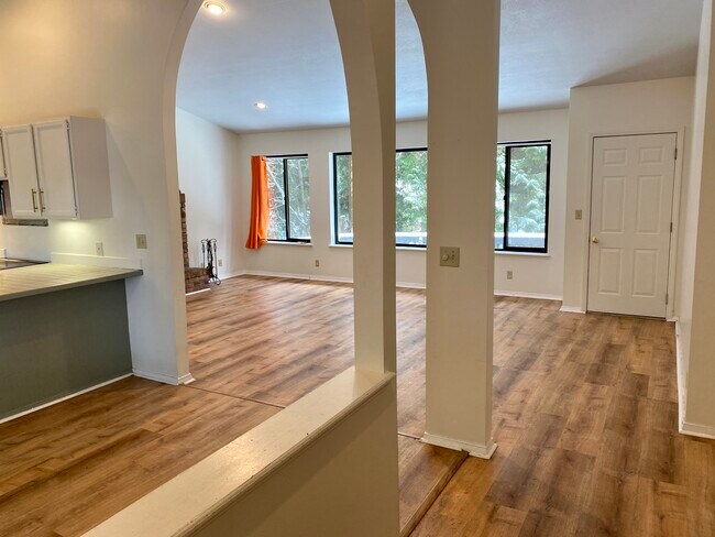 Light filled living room, wood burning fireplace - 840 Cherry Ave NE