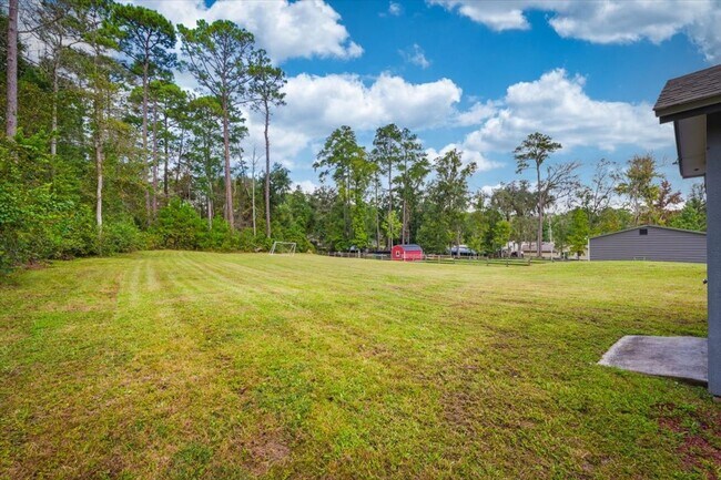 Building Photo - Beautiful 4BR Home with Fireplace, Screene...