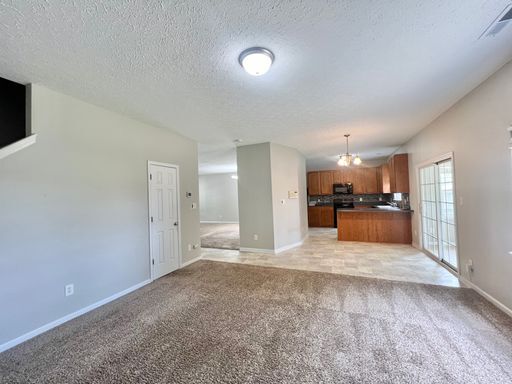 Building Photo - Charming 4BD, 2.5BA Durham Home with a Bonus Sun-Room & Fenced In Yard Only 10 Minutes Away from ...