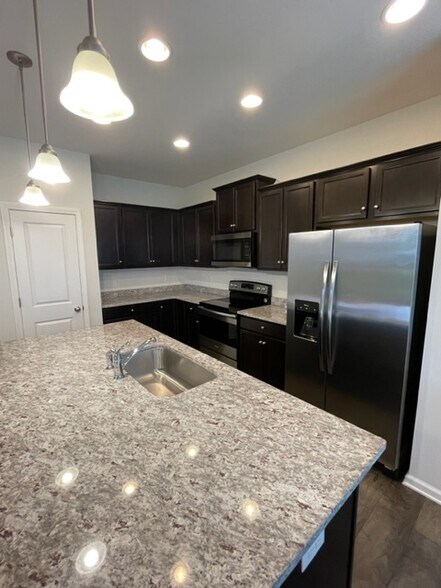 stainless steel appliances and pantry closet - 252 Castle Dr