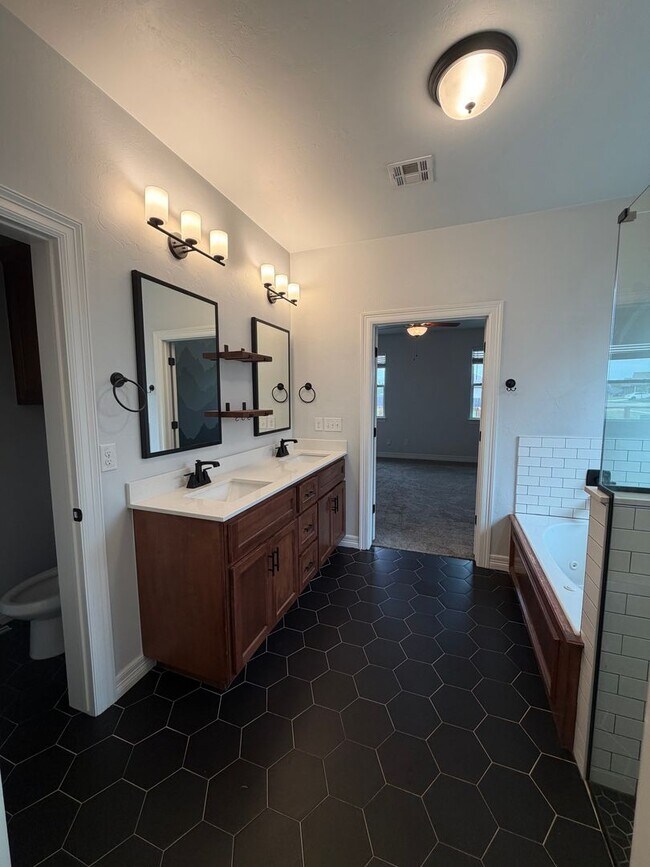 Building Photo - Community Pool - Lawn Care Included - Storm Shelter - Community Pool