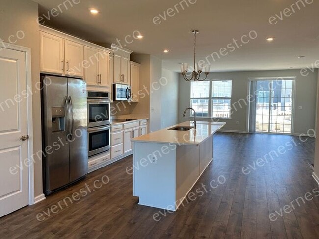 Building Photo - Beautiful 3 Story Townhome - THE LANDING A...