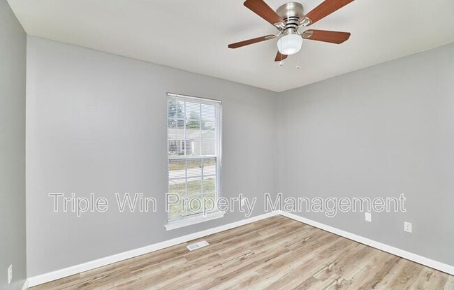 Building Photo - 4927 Triple Tree Ct