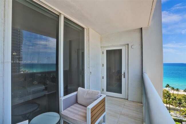 Building Photo - 10275 Collins Ave