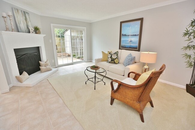 Building Photo - MUST SEE! Charming 3-Bedroom Townhome in Thoroughgood! 1-Car Attached Garage!