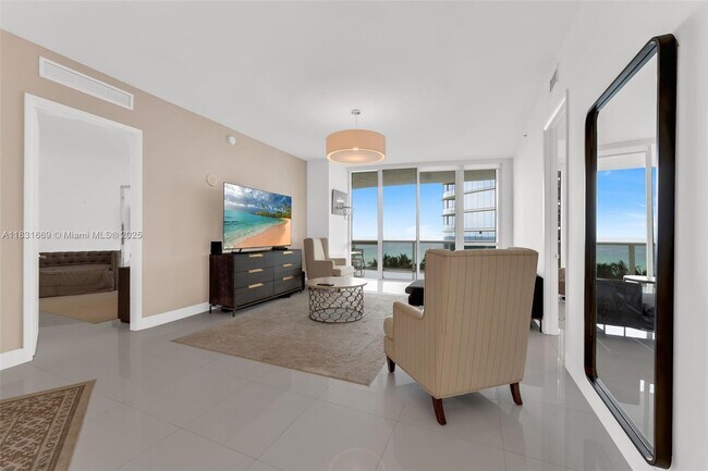 Building Photo - 15811 Collins Ave