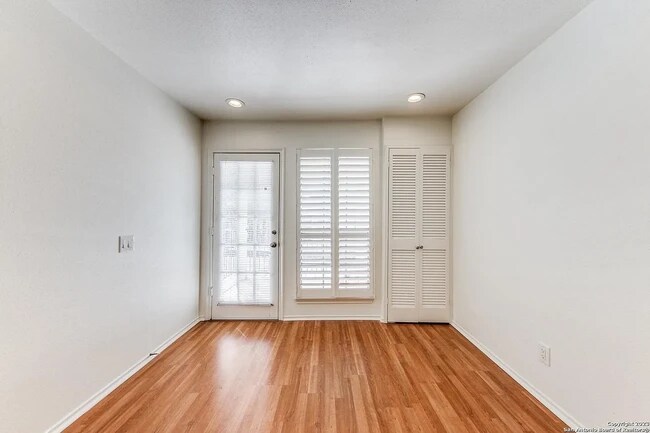 door to carpot - 7815 Broadway St