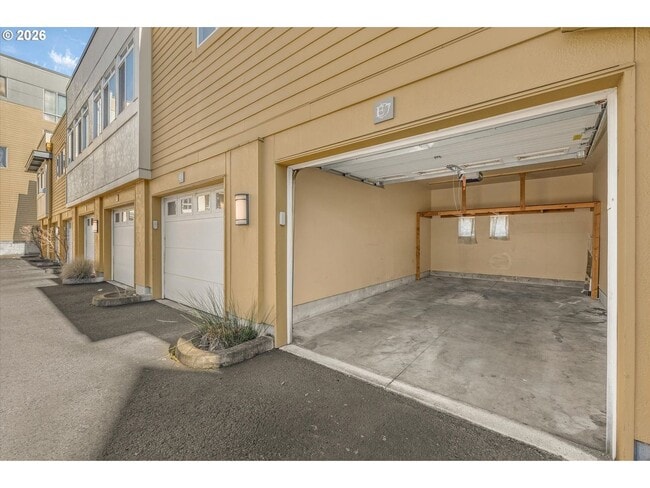 Building Photo - Main Street Living with Granite Kitchen, Gas Fireplace, and MAX Line Access