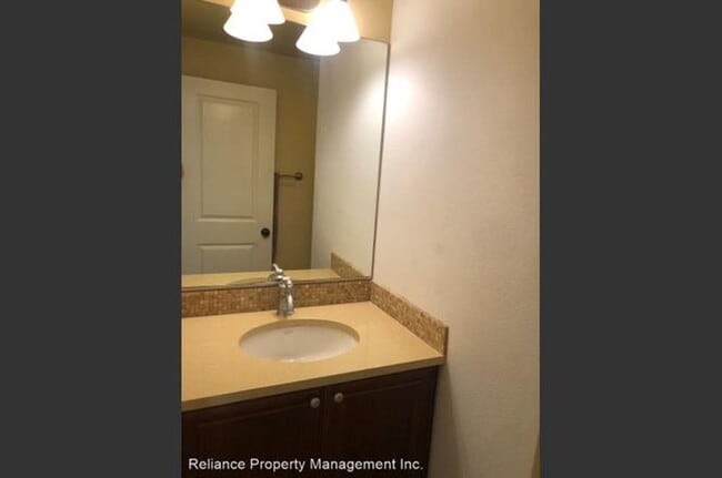 Building Photo - Stunning Tri-Level Condo with Open Concept Layout, Loft, and Private Patio!