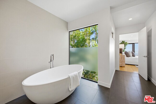 Building Photo - 6390 Quebec Dr