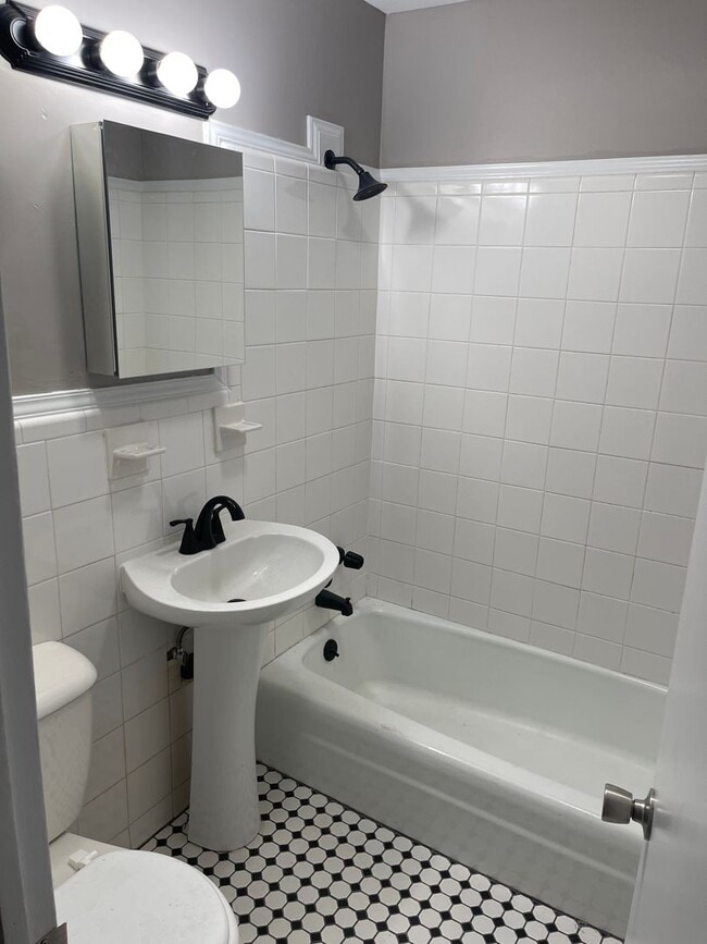 Building Photo - Beautifully renovated Normaltown 3/2 Home with fenced in front yard! Water, trash, and lawncare i...