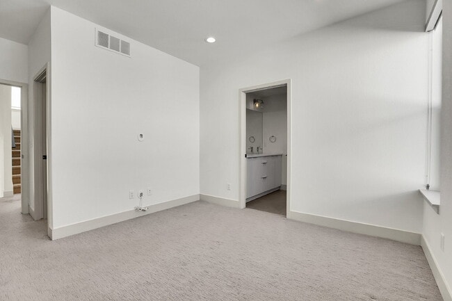 Building Photo - $3,100.00 - 2 Bedrooms, 2.2 Bathrooms, Townhouse in Denver with Roof Deck!