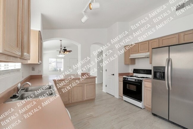 Building Photo - 5573 W Dove of Peace Dr
