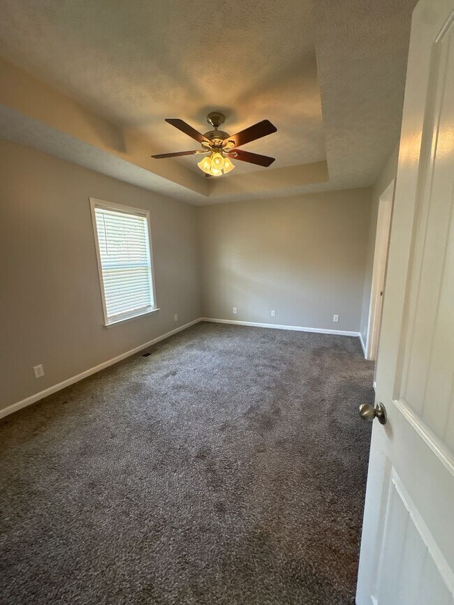 Building Photo - Charming Home with Covered Back Deck and Fenced in Yard...