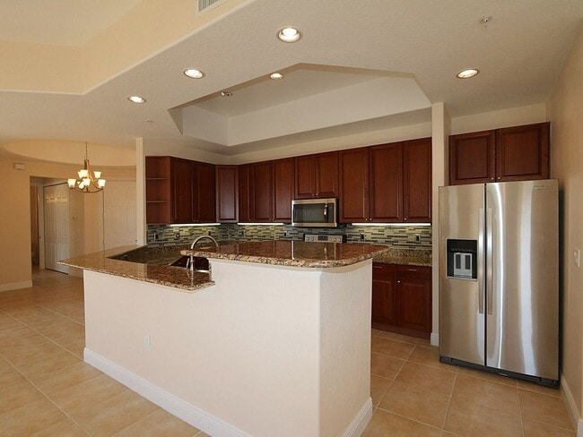 Building Photo - BEAUTIFUL 3-BEDROOM  WATERFRONT CONDO WITH BOAT SLIP AND HEATED POOL