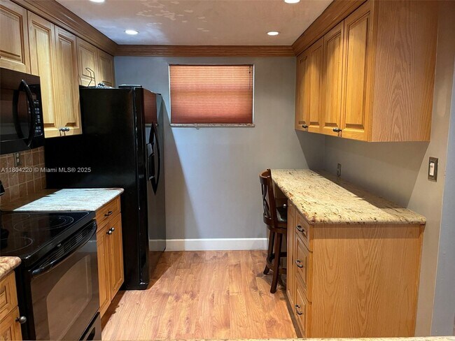 Building Photo - 8735 Ramblewood Dr