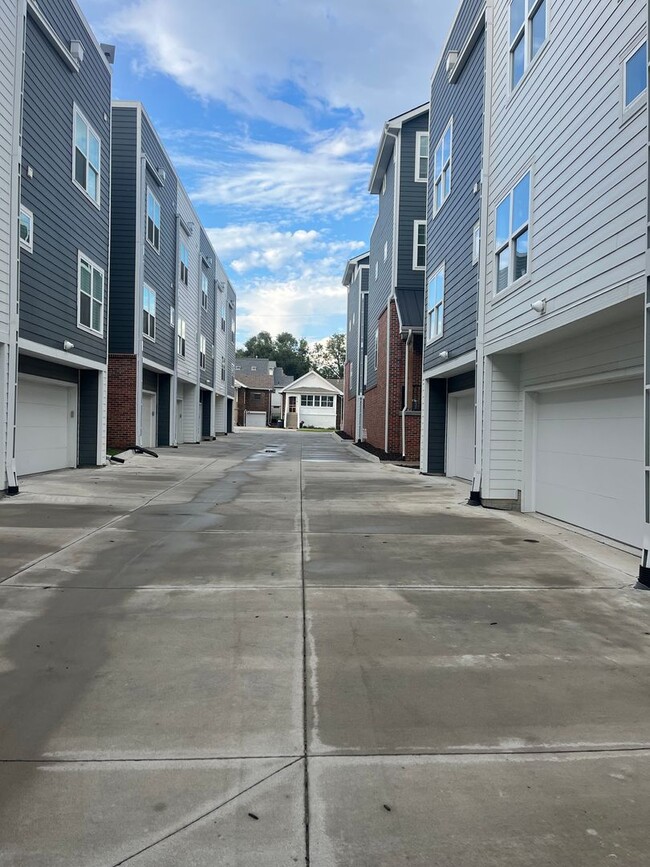 Building Photo - New Construction, 2 bed, 3 bath Row Home, with 2 car garage, fireplace, and rooftop deck!