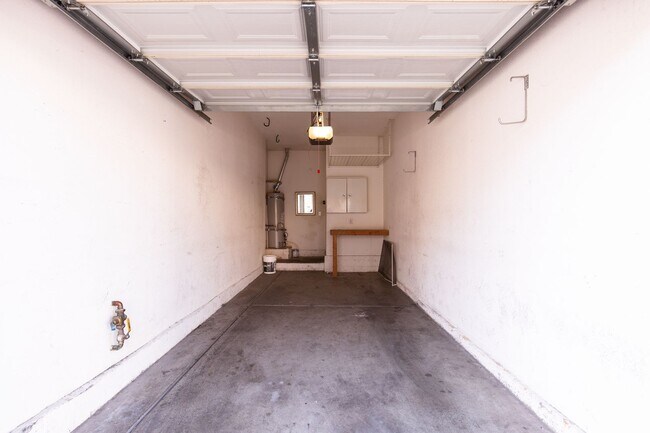 Building Photo - Two bedroom townhome with garage in gated ...