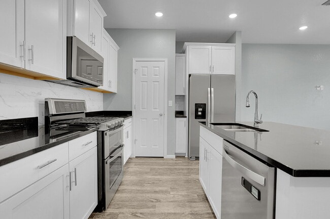 Building Photo - $2,395.95- 3 Bed, 2.5 Bath Townhome with Central AC, and In Unit Laundry!