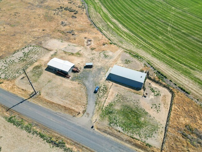 Building Photo - Country Living with a Huge Shop - 3BR on Acreage, Livestock Welcome!
