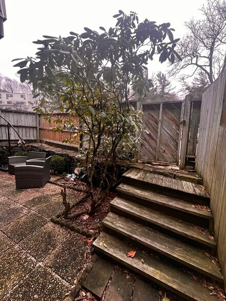 Patio entrance and exit from parking lot - 28 Hillside Ter