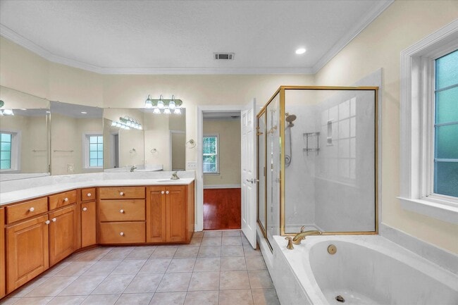 Building Photo - Stunning all-brick home on a large wooded lot