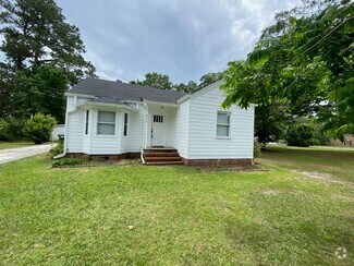 Building Photo - Introducing a charming 2-bedroom, 2-bathro...